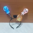 Kép 4/8 - Halloween rugós világító 3D koponyás fejpánt FEHÉR