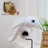 Kép 2/4 - FEHÉR Éjfúria plüss figura csuklóra 23cm